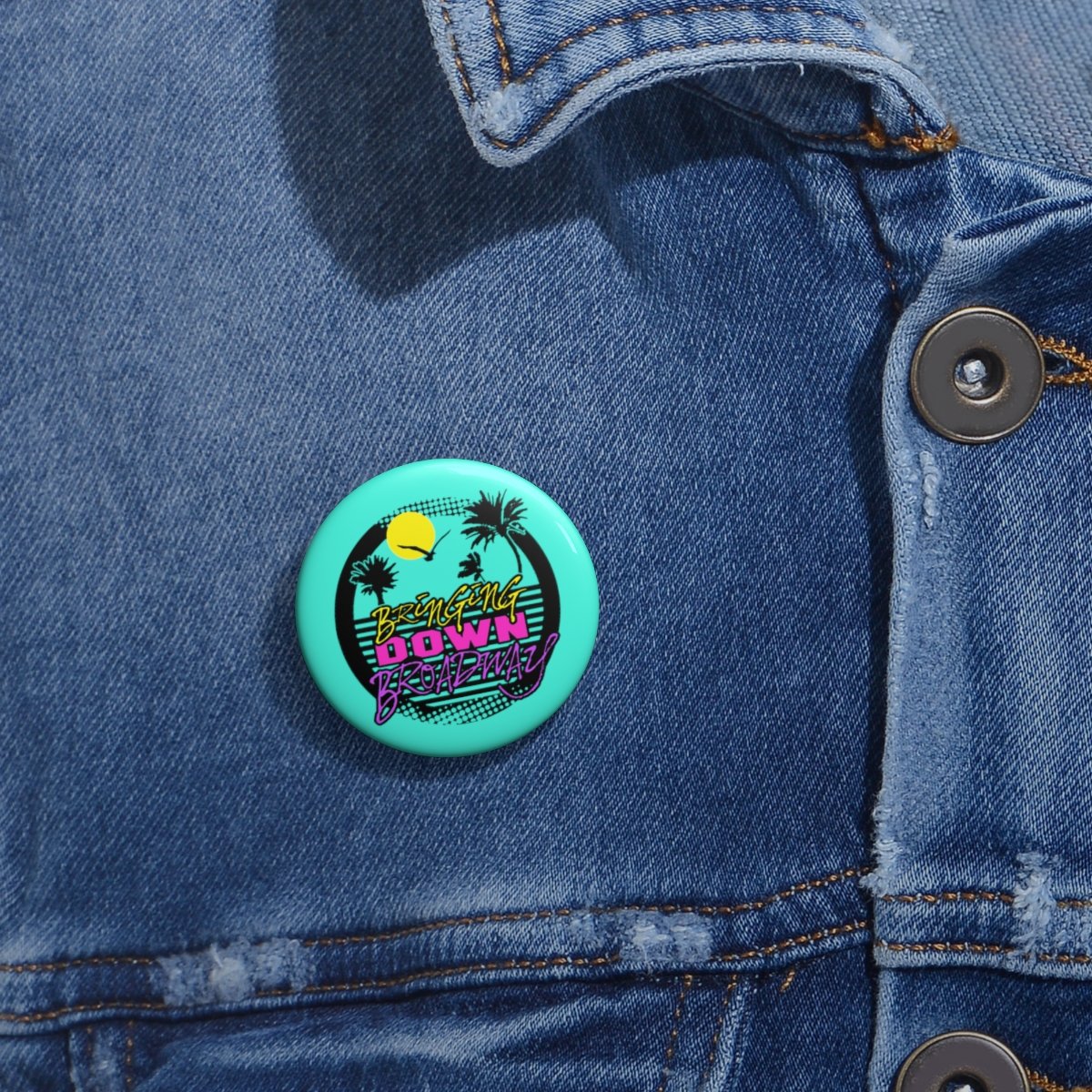 Bringing Down Broadway – Sun Pin Buttons (Teal)